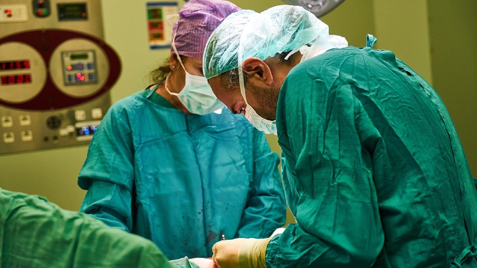 Doctors Performing Surgery Stock Photo