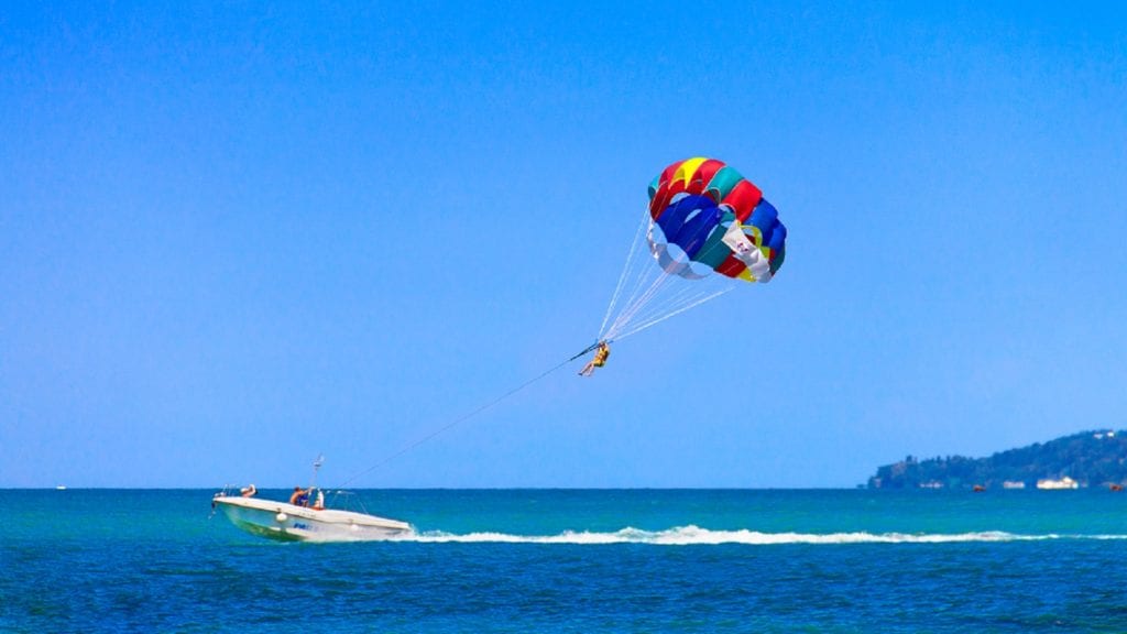 Parasailing On The Ocean Stock Photo